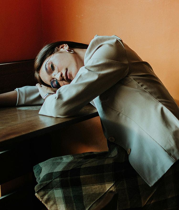 Woman sleeping at desk