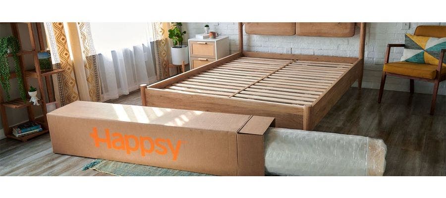 Happsy mattress foundation assembled with a Happsy mattress box nearby