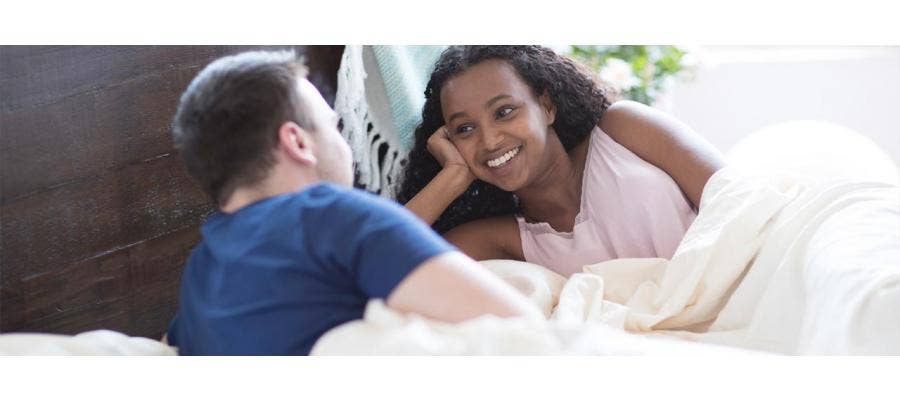 couple talking in bed