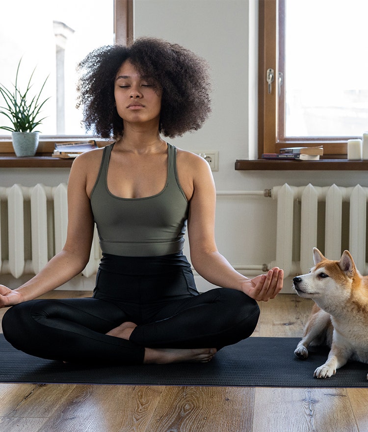 Young woman practicing a seated meditation