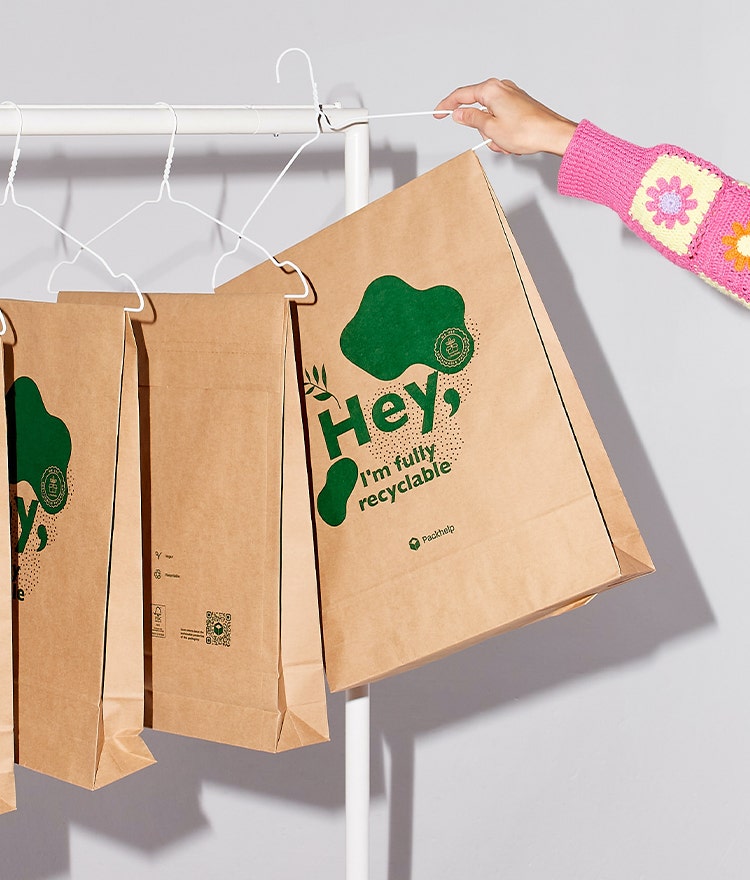 Paper bags labeled as fully recyclable