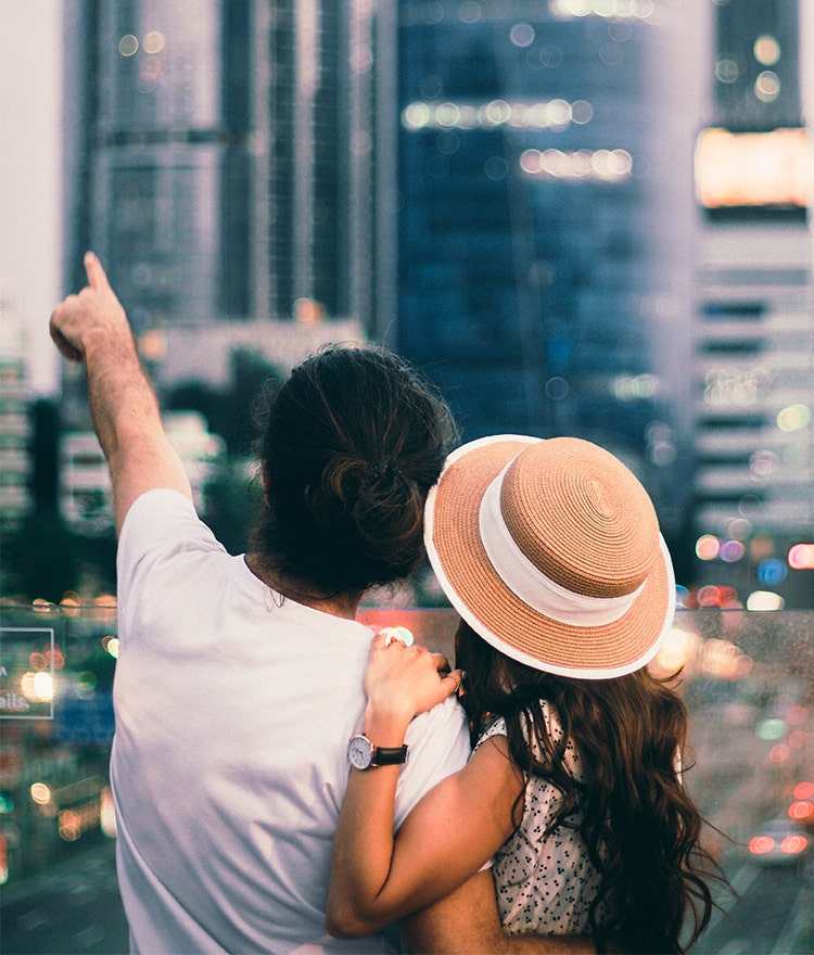 Couple sight-seeing together in a big city